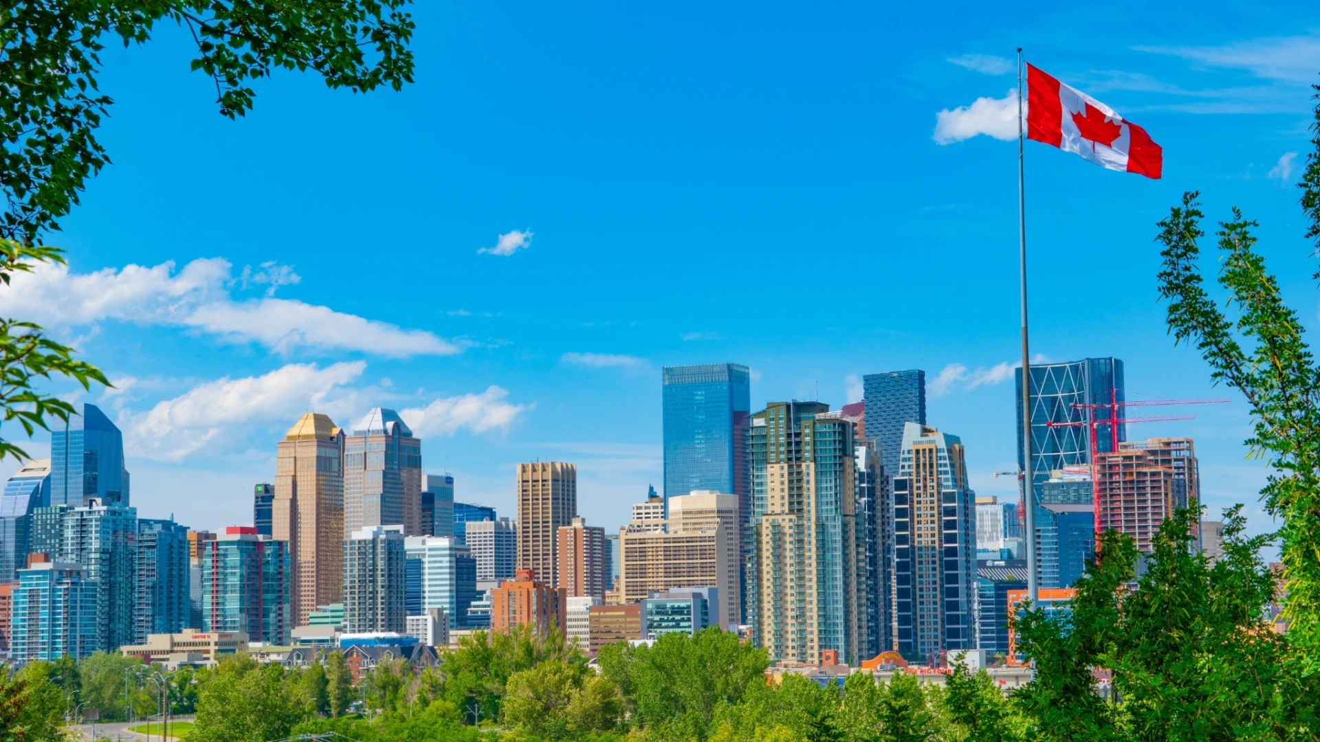 Calgary downtown skyline with Canadian flag, Alberta
